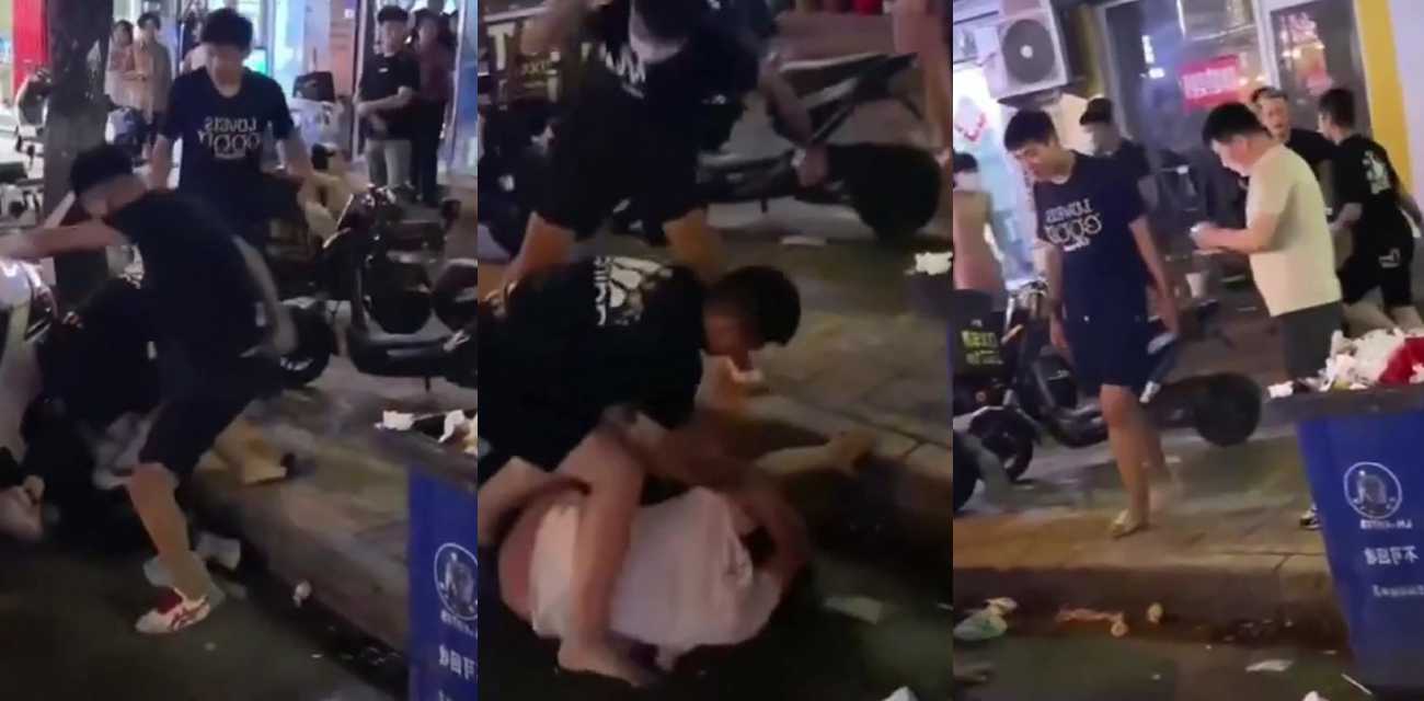 街头群殴冲突激烈上演 男子光膀粉短裤街头互殴 多人围观打斗现场流出！