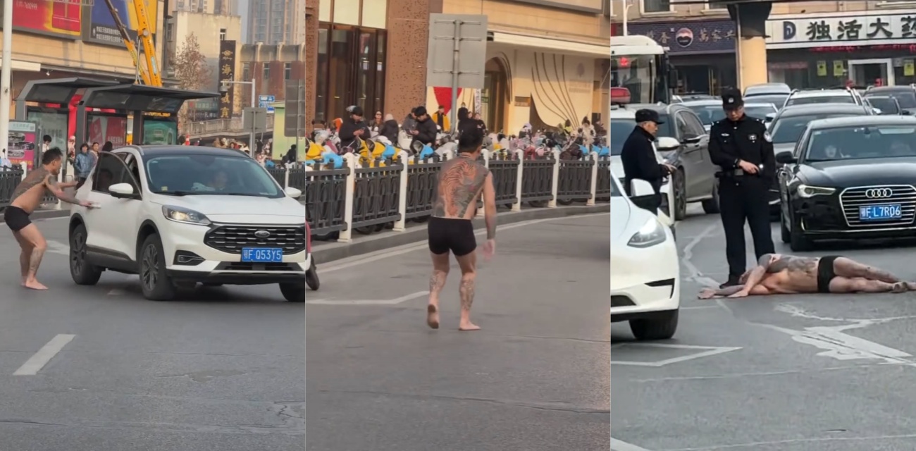 湖北襄阳纹身大哥街头裸奔拦车 胡言乱语乱跑拦车致交通拥堵